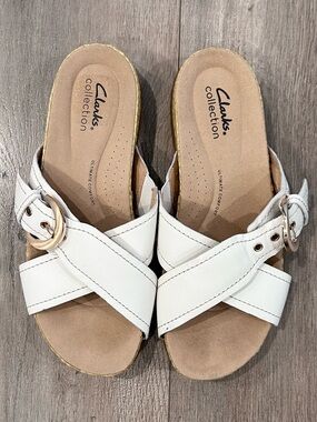 Clarks White Leather Crisscross Slide Sandals with Gold Buckle